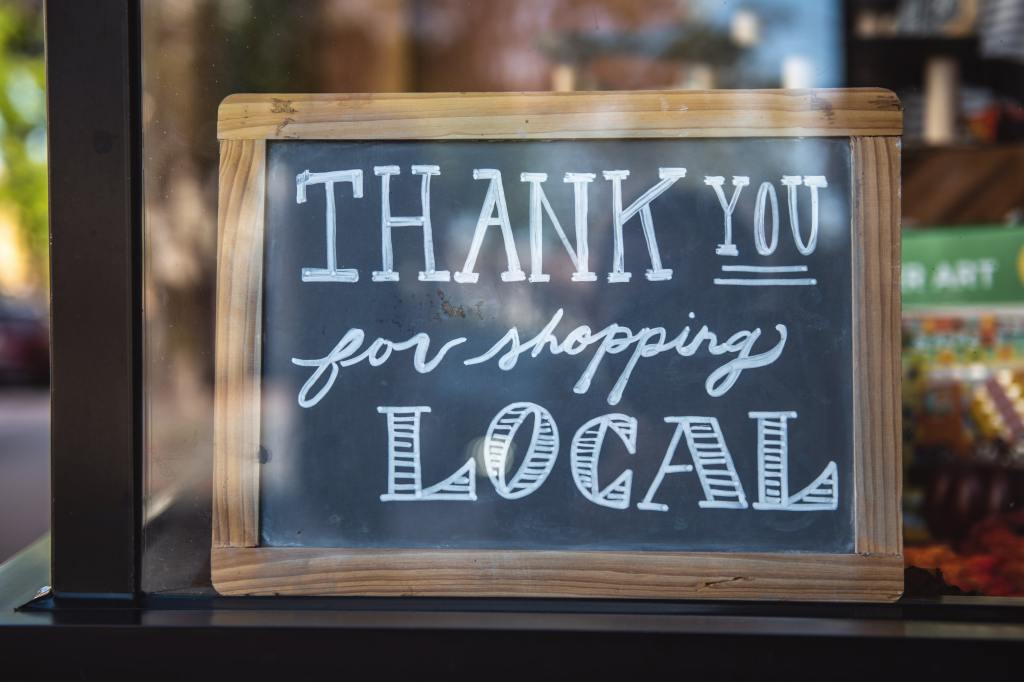 photograph of "thank you for shopping local" sign