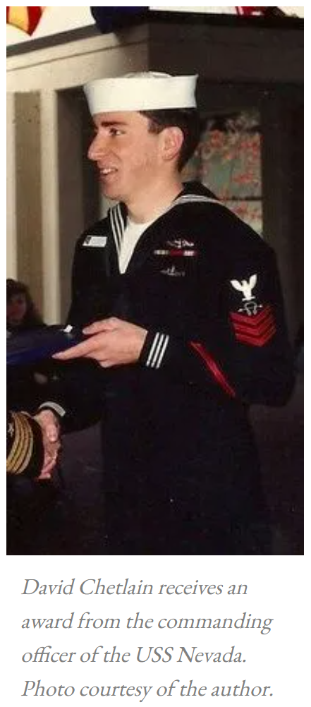 photo of david chetlain receiving an award from the commanding officer of the uss nevada. photo courtesy of david chetlain.